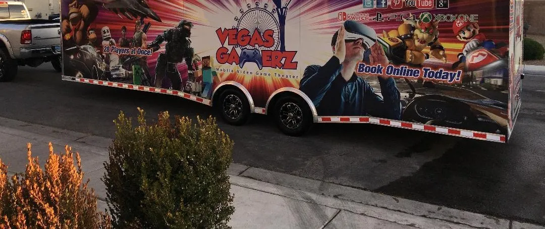 The full 32-foot Vegas Gamerz trailer parked along a residential Las Vegas street